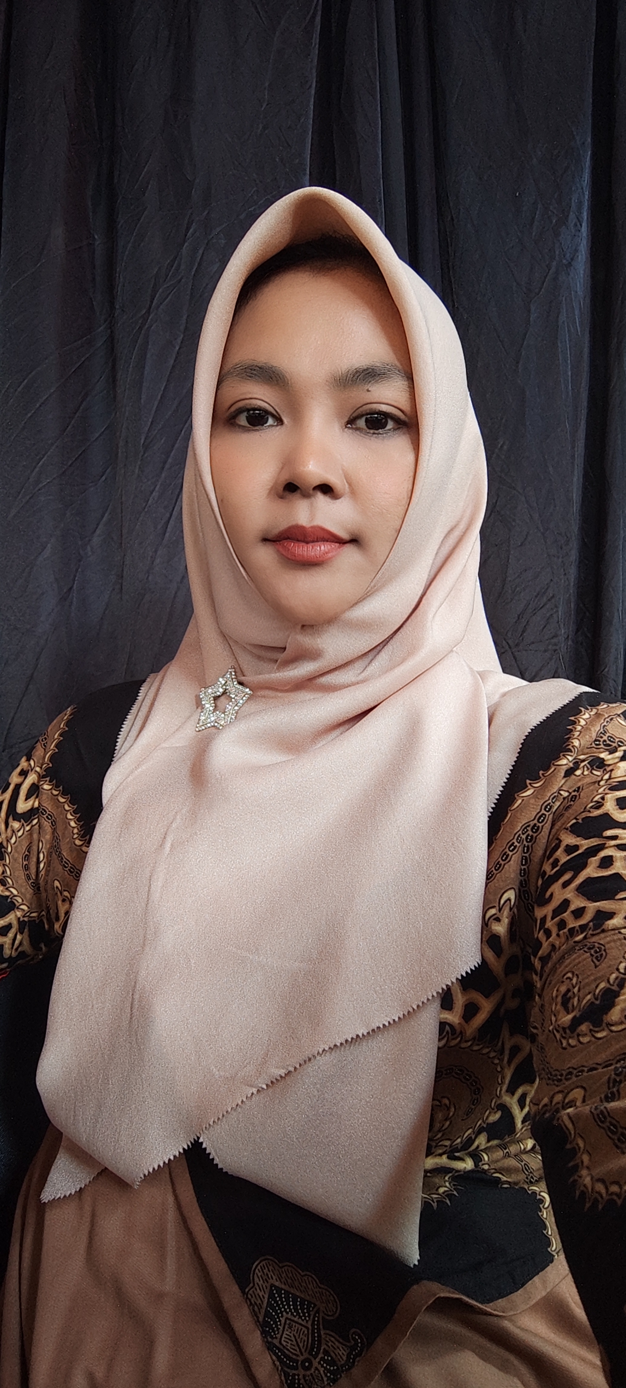 Agus Winarsih, SP., M. Si